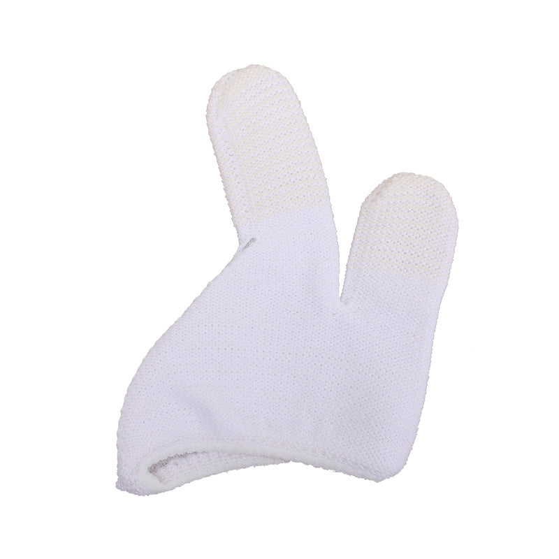 Guante blanco de dedo para limpieza dental de mascotas.